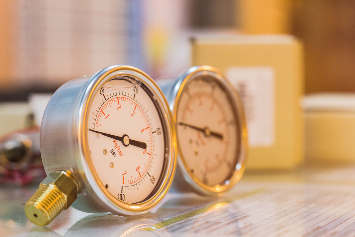 close-up-of-new-set-of-pressure-gauge-on-glass-table-preparation-maintenance